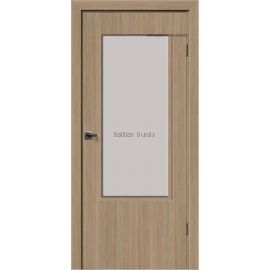 Iekšdurvis Bella Kristal-L SPEC PRO dabīgā ozola koka tonī un lielu stikla pildiņu durvju augšdaļā, kas rada gaišumu un plašuma sajūtu.